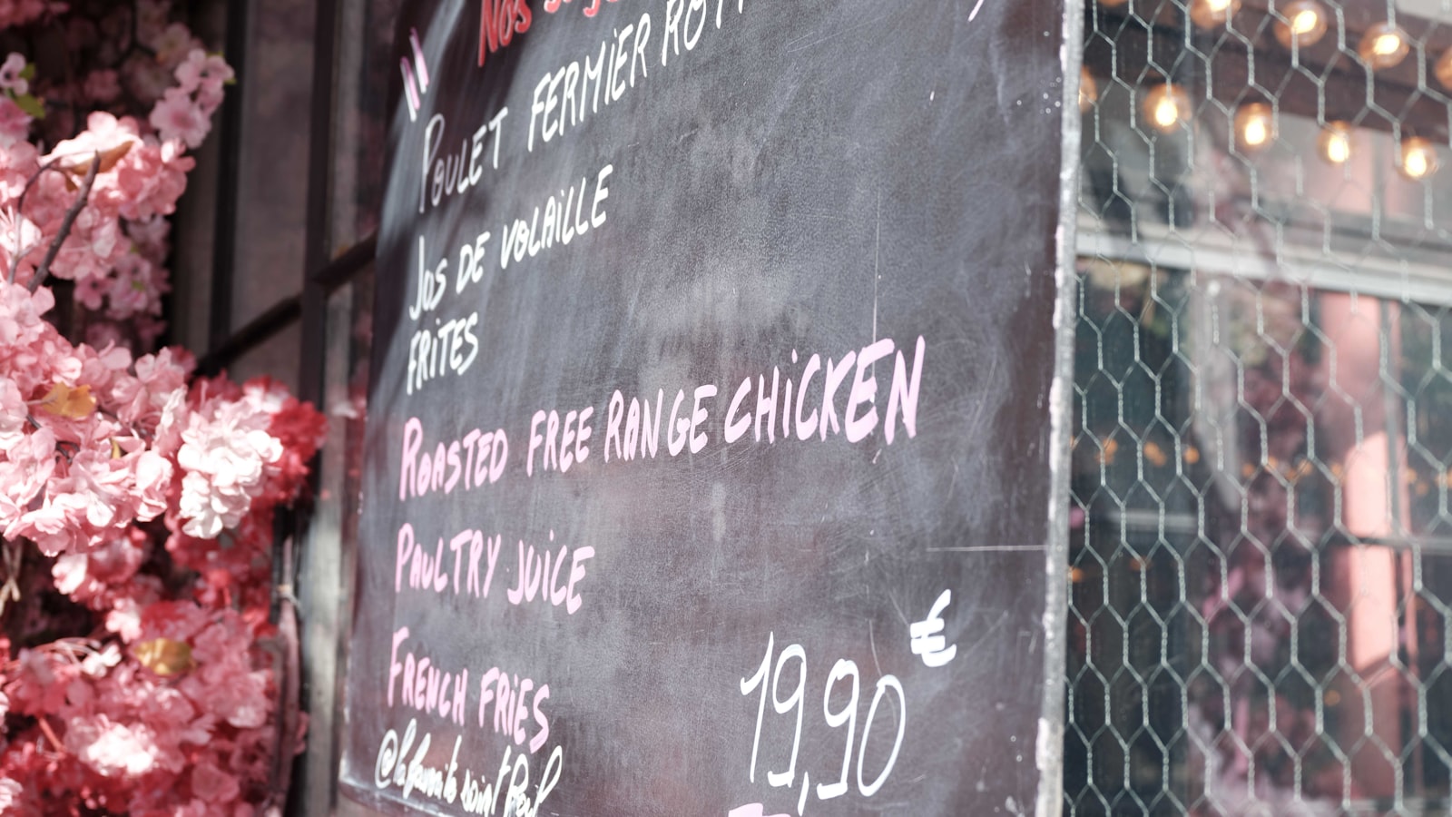 A chalkboard listing a restaurant's daily specials